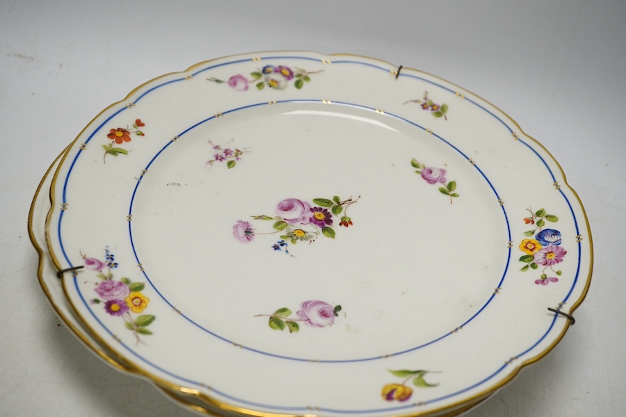 Three porcelain plates comprising an 18th century Meissen floral example and two Sevres, together with an 18th century polychrome tin glazed, largest 25cm in diameter. Condition - fair